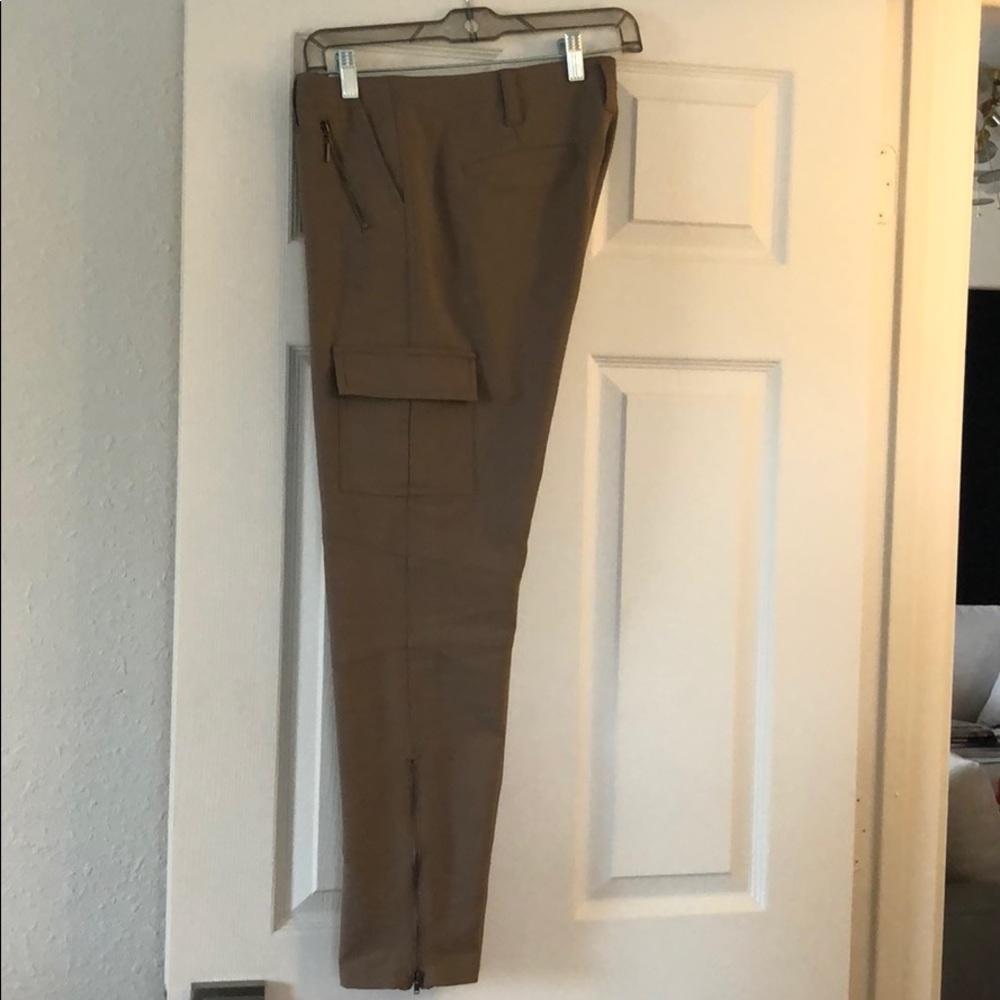 Slim cut pants with pocket and zipper details